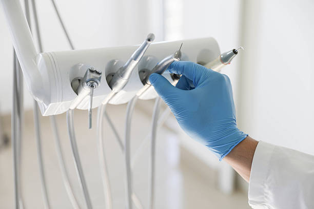 Professional Tooth Extraction technician working in Lantana, FL